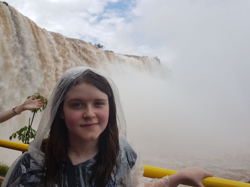 At the Iguazu Falls, completely wet even though I had put on my waterproof poncho.