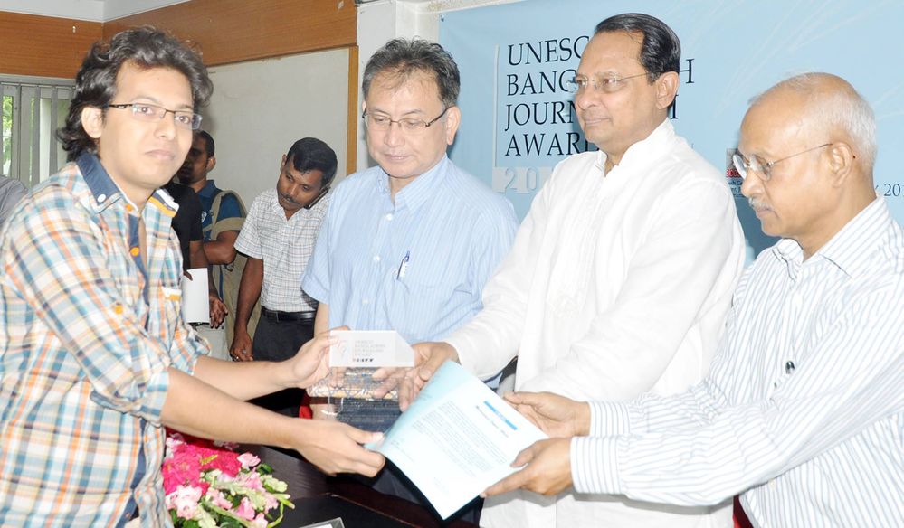 I Received the UNESCO-BANGLADESH Journalism Award 2014 from Information Minister