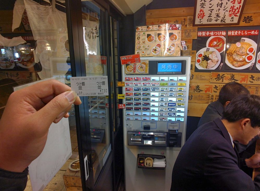 Vending machine to purchase coupon for food